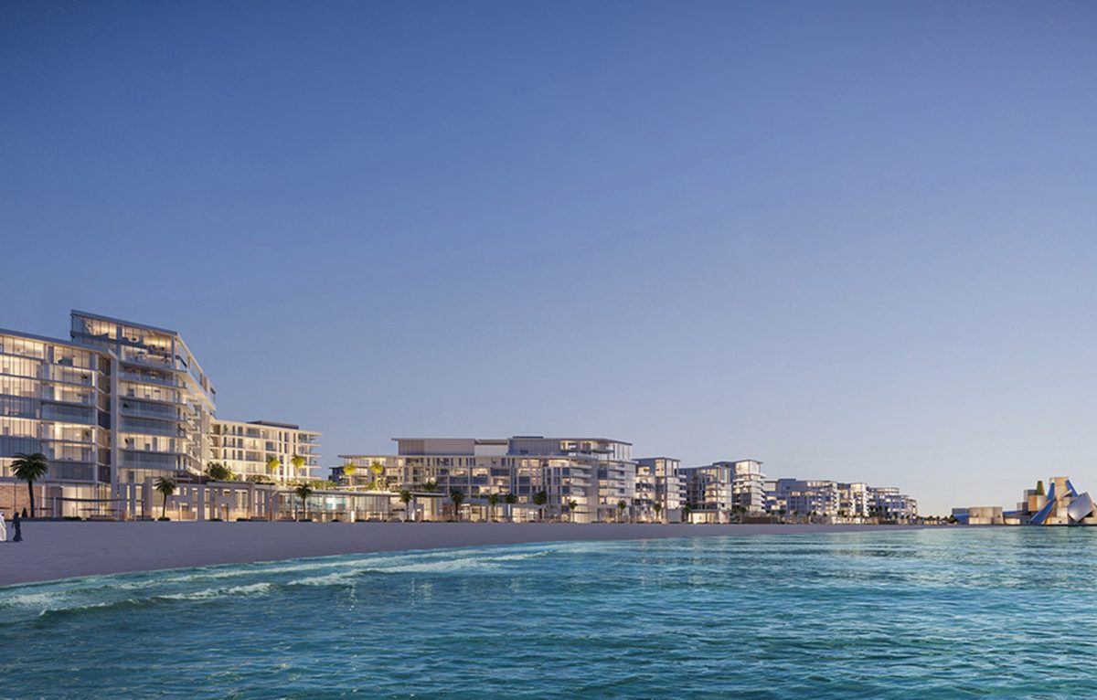 The Mamsha Al Saadiyat beachfront row seen from the water, the Guggenheim Abu Dhabi at the far end